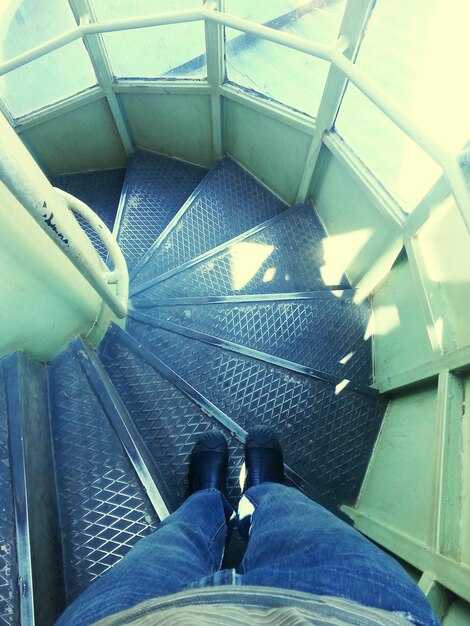 What are the costs, hours, and access rules for JFK sleeping spaces?